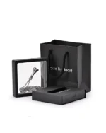 Twisted bar cremation necklace displayed in a floating presentation frame with gift packaging