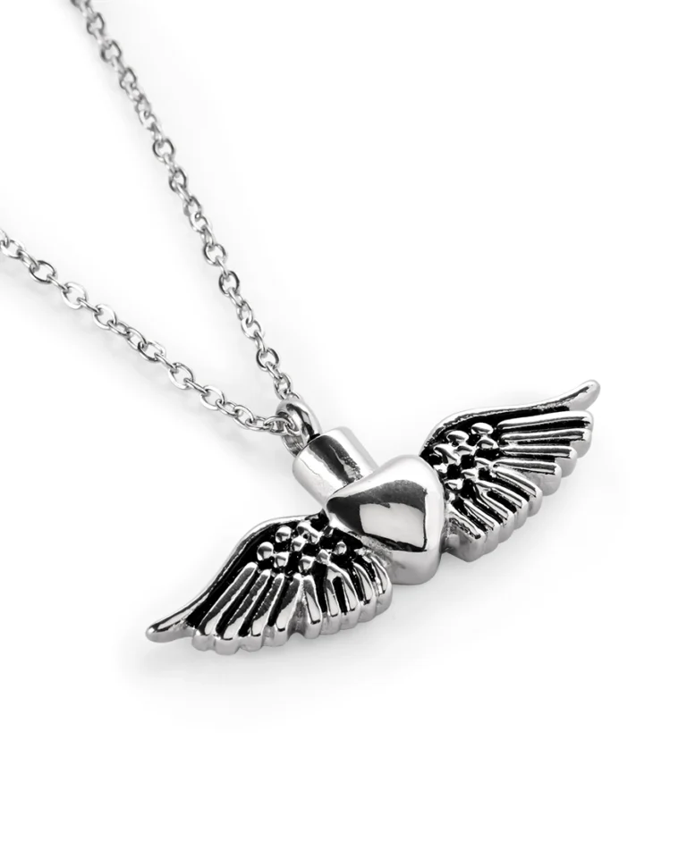 Winged heart urn necklace for ashes with polished center heart, sculpted angel wings and 20 inch stainless steel chain