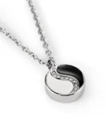 Yin Yang cremation necklace for ashes with black and silver 316L stainless steel design and curved crystal accents