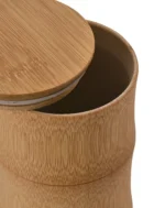 Close-up of a natural bamboo pet urn showing the bamboo wall, raised node, top opening, and removable lid with sealing ring